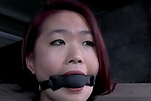 Redhead asian sub with mouth gag dominated